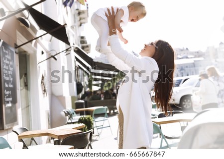 Happy loving family,preparing bakery together.Mother and child daughter girl spend time together,laughing and playing,eat cookies and having fun at cafe.Homemade restaurant,little helper.hold in hands