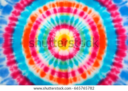 Blur fabric Tie dye bright colors texture background. Royalty-Free Stock Photo #665765782