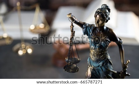 Law symbols on rustic desk