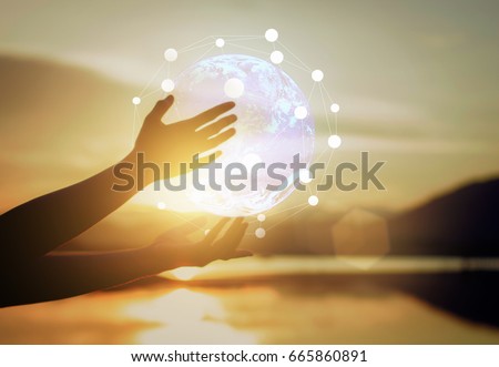 Abstract science, circle global network connection in hands on sunset background
/ soft focus picture / Vintage concept