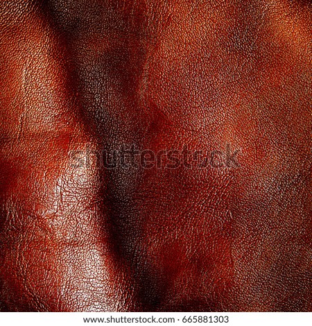 Background of brown leather. Texture of brown leather. Natural brown leather