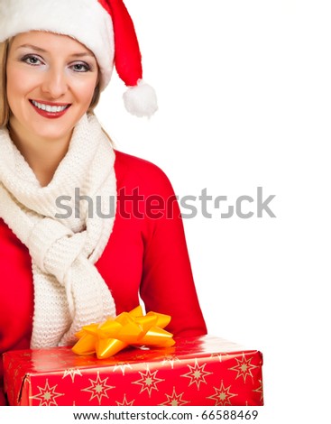 Woman in santa hat with christmas presents