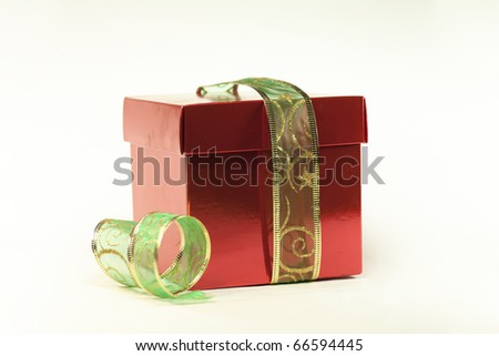 a gift with green ribbon