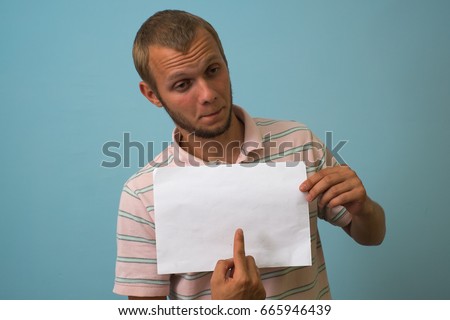 Man with a piece of paper