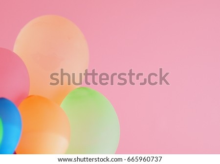Multiple balloons,over pink background 