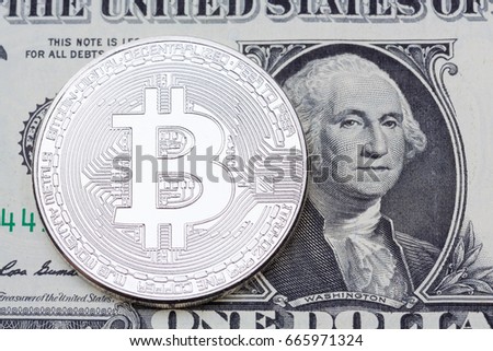 Bitcoin on one dollar banknote. Trading, busines concept. Hi res photo.