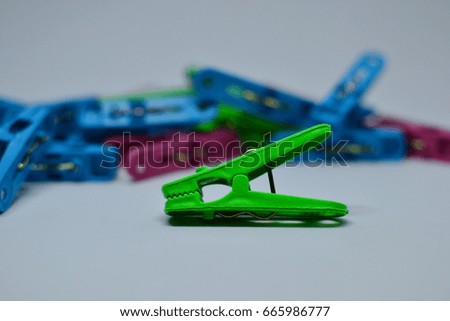 Colorful clothes clip isolated on white background