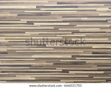 Striped light and dark brown wooden background