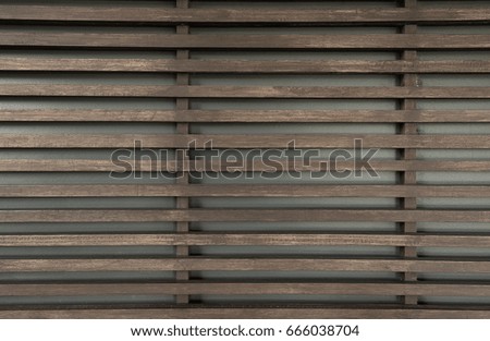 Raw wood, wooden slatted fence or lath wall background texture, vintage tone with vignetting