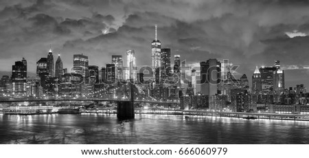 Black and white panoramic picture of New York City at night, USA.