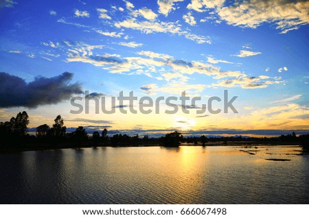 lake,blue sky and clouds background
