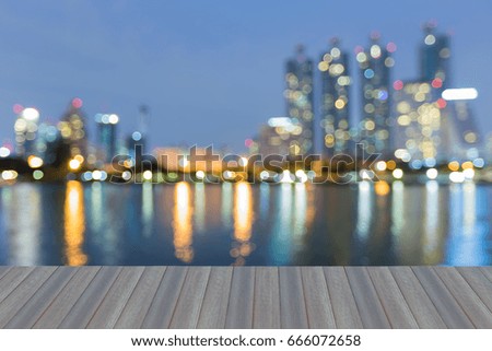 Opening wooden floor, Office building blurred bokeh light at twilight, abstract background