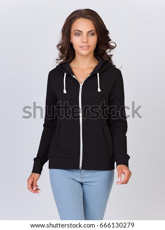 Beautiful woman in the template of a women's sweatshirt of black color