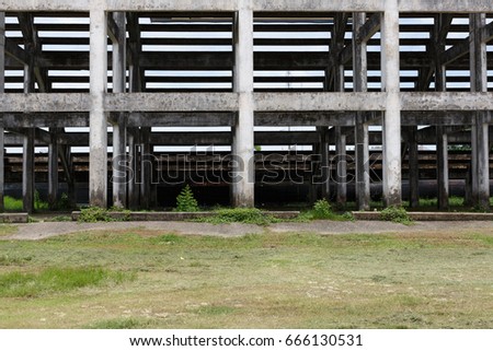 Under the Grandstand building Stadium with many cement pillars