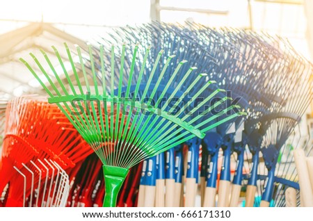 Comb rake, in a shop of different colors
