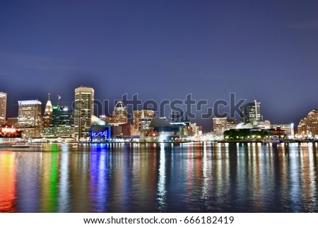 Baltimore inner harbor cityscape at night