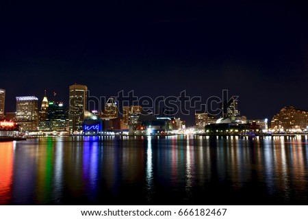 Baltimore inner harbor cityscape at night