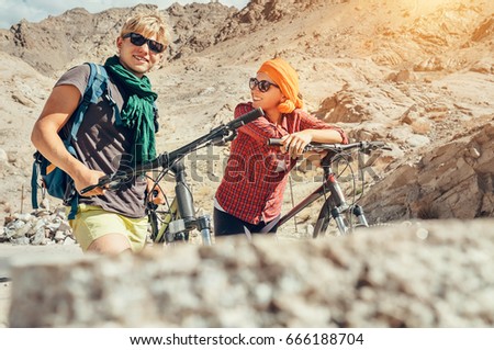 Two cyclists traveler are in mountain