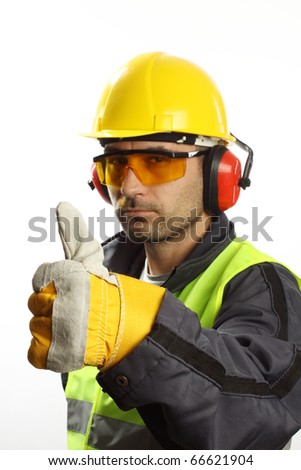 Worker with protective gear with thumbs up
