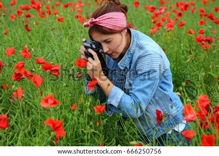young girl in field of poppies pictures of flowers