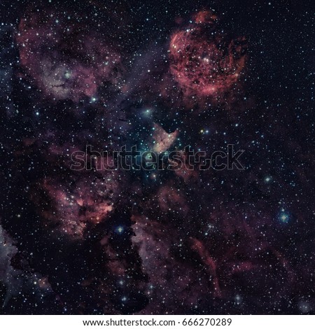 The Cat's Paw Nebula or NGC 6334 lies in the constellation of Scorpius. Elements of this image furnished by NASA.