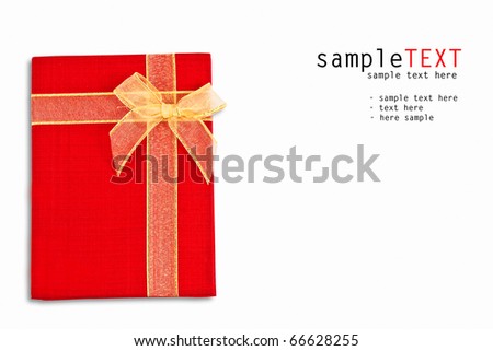 Ribbon on red notebook isolated on white background