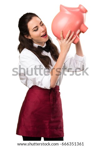 Young beautiful waitress holding a piggybank