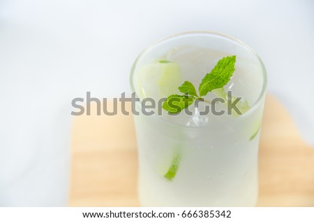 Lemon soda put on Wooden tray on white background.