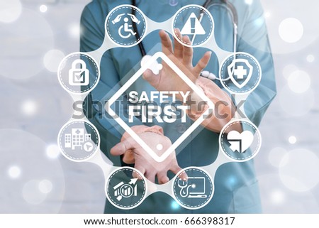 Work Safety Concept - regulations and standard in medical hospital. Doctor offers safety first sign on virtual screen. First secure rules.