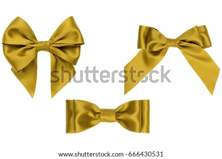 Set of gold ribbon satin bows isolated on white
