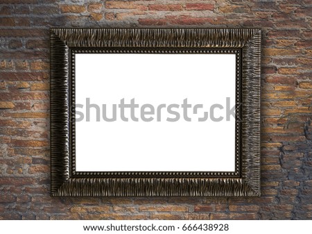 Old picture frame on rustic brick wall background