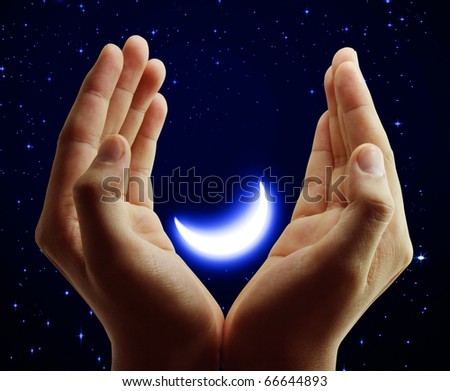 Beautiful hands with the moon