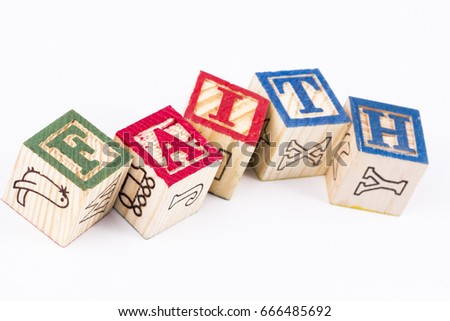faith word with wooden blocks