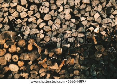 cut up firewood background with faded hispter colour edit 