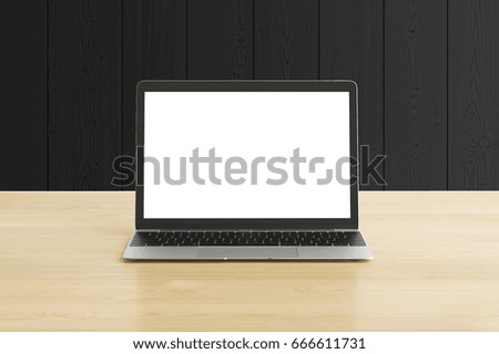 Laptop on wood table