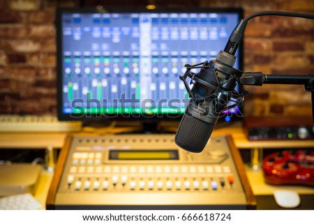 condenser microphone on sound mixer background in broadcasting, recording, post production studio