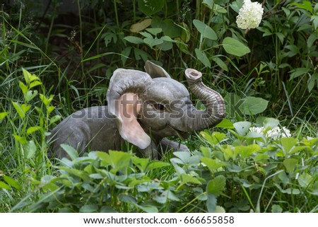 Elephant sculpture on the grass