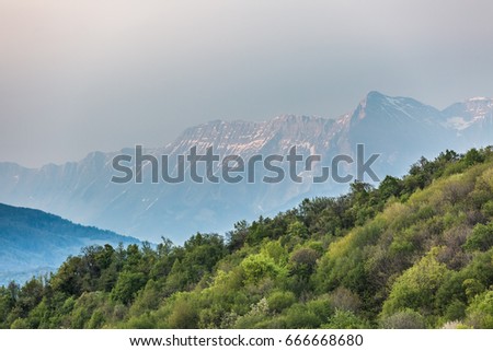 spring mountains landscape. view of Friuli-Venezia Giulia, mountains forest background from Castelmonte Prepotto Udine Italy
