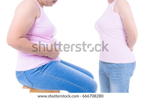 fat overweight women pinching her fat tummy. she wants lose weight to body slim.
