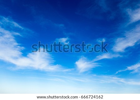 Clouds against blue sky as background Royalty-Free Stock Photo #666724162