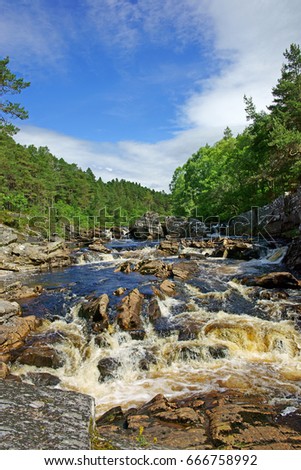 The rapids of Blackwater River in summer near Little Garve Ross and Cromarty Scotland