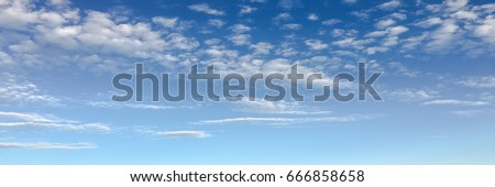 Beautiful clouds with blue sky background. Nature weather, cloud blue sky and sun Royalty-Free Stock Photo #666858658
