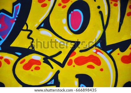 Detailed image of color graffiti drawing. Background street art picture. Part of the colorful masterpiece by the professional graffiti artist