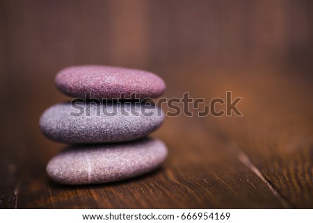 Spa with stone, rock for zen, beauty, balance, wellness on wooden background. Concept of health, therapy, relaxation. Massage treatment for tranquil and harmony, relax.