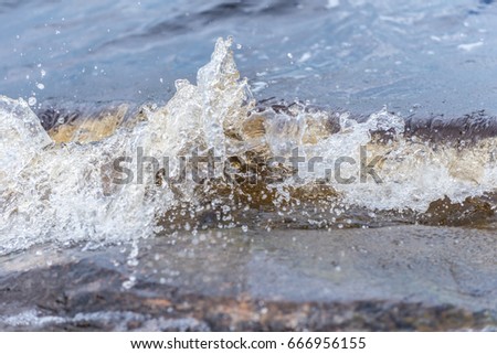 Water drops and waves. Splashing wave. Wave background.