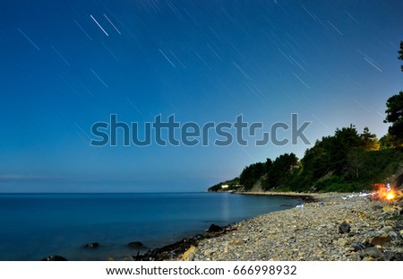 star trails on beach
