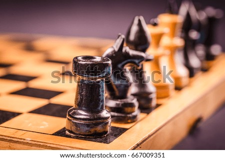 Chess. Strategy game. Competition success play. Intelligence challenge concept. King move on chessboard. White and black pawn on board. Business leadership. Leisure sport.