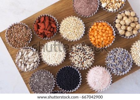 Various superfoods, seeds, cereals, grains on a  white background. Healthy eating concept. Flat lay, copy space for text