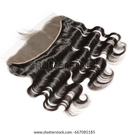 Natural black  virgin remy body wave human hair extensions wide range lace frontal closure  Royalty-Free Stock Photo #667085185