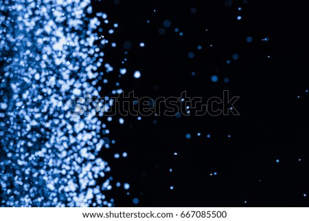 Abstract white powder explosion on black background   